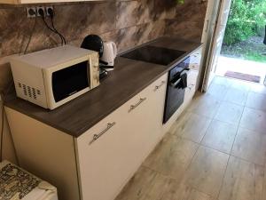 Kuchyňa alebo kuchynka v ubytovaní Roland Apartmant Zuglo