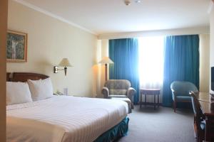 Letto o letti in una camera di Grand Arkenso Park View