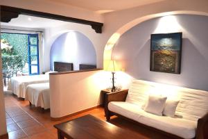 Letto o letti in una camera di Posada del Cafeto