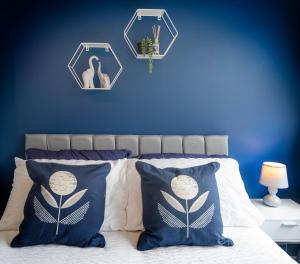 מיטה או מיטות בחדר ב-Bright & modern 4 bedroom townhouse