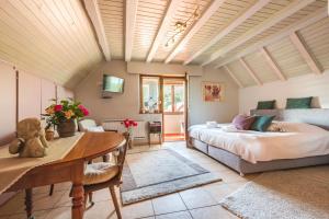 Postel nebo postele na pokoji v ubytování Chambre du Vigneron - Domaine Léon BLEESZ
