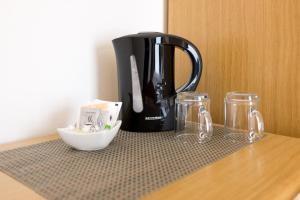 Kemudahan buat kopi dan teh di New Garden