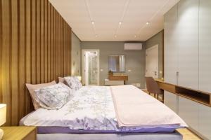 Ένα ή περισσότερα κρεβάτια σε δωμάτιο στο Luxury Apartment in Tirana