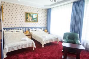 Postel nebo postele na pokoji v ubytování LidoLux