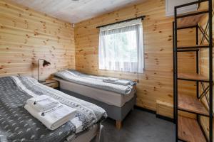 Posteľ alebo postele v izbe v ubytovaní Sudecki Domek