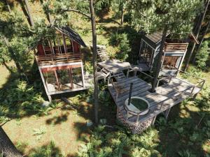 an overhead view of a house with chairs and a table at Amaya Retreat in Sóc Sơn