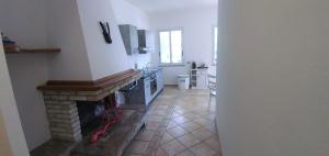 Kuchyň nebo kuchyňský kout v ubytování ALICE B&B + 22 fotografií