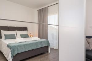 Postel nebo postele na pokoji v ubytování Villa Sarah