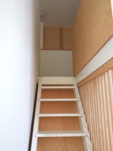 a room with a ladder in a room at Le Bigorneau , beach at 20m and free private carpark in Saint Malo