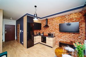 Zdjęcie z galerii obiektu Apartament ,, COŚ NIECOŚ ,, Suwałki LOFT, KLIMATYZACJA, PRYWATNY PARKING, MONITOROWANE ZAMKNIĘTE OSIEDLE w mieście Suwałki
