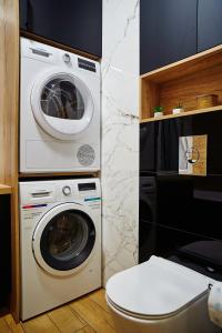Zdjęcie z galerii obiektu Apartament ,, COŚ NIECOŚ ,, Suwałki LOFT, KLIMATYZACJA, PRYWATNY PARKING, MONITOROWANE ZAMKNIĘTE OSIEDLE w mieście Suwałki