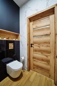 Zdjęcie z galerii obiektu Apartament ,, COŚ NIECOŚ ,, Suwałki LOFT, KLIMATYZACJA, PRYWATNY PARKING, MONITOROWANE ZAMKNIĘTE OSIEDLE w mieście Suwałki