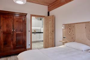 Posteľ alebo postele v izbe v ubytovaní Apartamentos Ea Astei