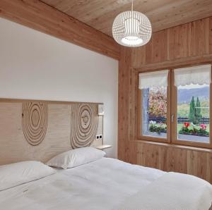 Postel nebo postele na pokoji v ubytování Apartamentos Ea Astei + 37 fotografií