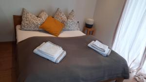 Postel nebo postele na pokoji v ubytování Appartment Römerstrasse