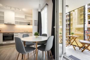 Kuchyňa alebo kuchynka v ubytovaní Szabolcs Apartments