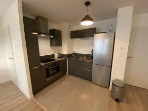 Kuchyň nebo kuchyňský kout v ubytování Kerijsel T3 Arzon Port du Crouesty et Port-Navalo