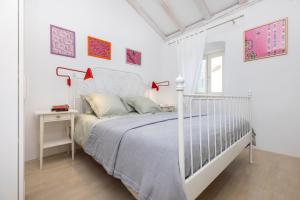 Кровать или кровати в номере House Encanto