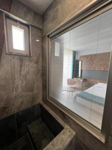 Ein Badezimmer in der Unterkunft Ladik Hotel