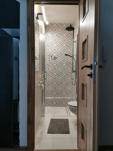 Vannituba majutusasutuses Przytulny apartament w wieżowcu - Centrum miasta Podwisłocze 38