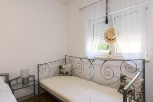 Postel nebo postele na pokoji v ubytování Apartments Mare Trogir