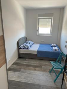 Ein Bett oder Betten in einem Zimmer der Unterkunft Villa Iva Vodice