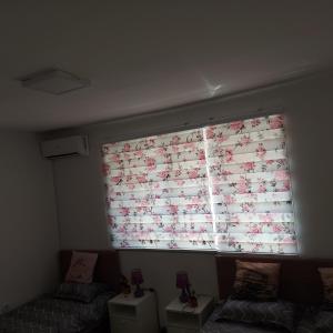A bed or beds in a room at Lovely, neat and quite apartment Dalia, private parking