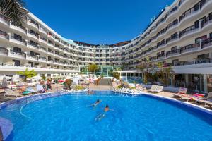 Бассейн в Tigotan Lovers & Friends Playa de las Americas - Adults Only (+18) или поблизости