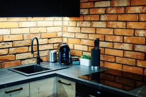 Zdjęcie z galerii obiektu Apartament ,, COŚ NIECOŚ ,, Suwałki LOFT, KLIMATYZACJA, PRYWATNY PARKING, MONITOROWANE ZAMKNIĘTE OSIEDLE w mieście Suwałki