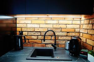Zdjęcie z galerii obiektu Apartament ,, COŚ NIECOŚ ,, Suwałki LOFT, KLIMATYZACJA, PRYWATNY PARKING, MONITOROWANE ZAMKNIĘTE OSIEDLE w mieście Suwałki