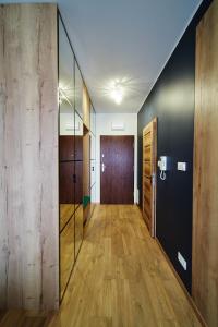 Zdjęcie z galerii obiektu Apartament ,, COŚ NIECOŚ ,, Suwałki LOFT, KLIMATYZACJA, PRYWATNY PARKING, MONITOROWANE ZAMKNIĘTE OSIEDLE w mieście Suwałki