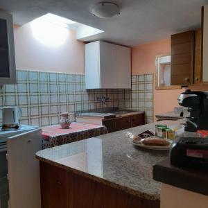 A kitchen or kitchenette at La Casa di Agnese