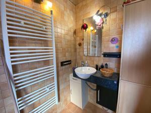 A bathroom at Platanus Inn Apartments by "elite"