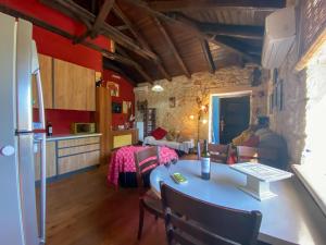 A kitchen or kitchenette at Platanus Inn Apartments by "elite"