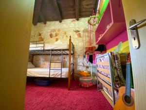 A bed or beds in a room at Platanus Inn Apartments by "elite"