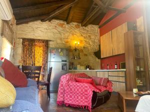 A seating area at Platanus Inn Apartments by "elite"