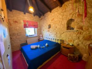 A bed or beds in a room at Platanus Inn Apartments by "elite"