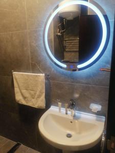 Ванная комната в Al-Ahlam Hotel Apartments