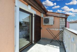 TV a/nebo společenská místnost v ubytování Apartment Mirela 2145
