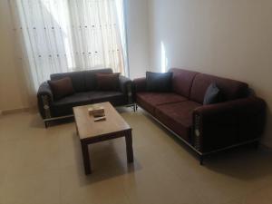 Zona d'estar a Al-Ahlam Hotel Apartments