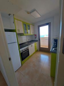 Kuchnia lub aneks kuchenny w obiekcie Rocasol - Suites