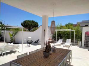 A balcony or terrace at Casa Vacanza "La Mangiatoia in corte"