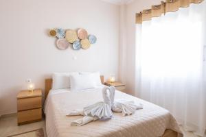Postel nebo postele na pokoji v ubytování Mystique Apartment