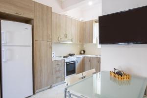 Kuchyň nebo kuchyňský kout v ubytování Mystique Apartment