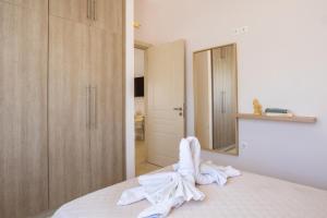 Postel nebo postele na pokoji v ubytování Mystique Apartment