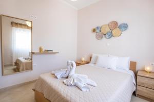 Postel nebo postele na pokoji v ubytování Mystique Apartment