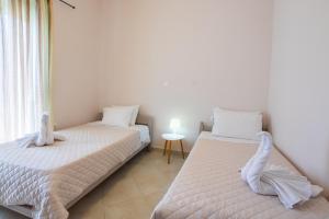 Postel nebo postele na pokoji v ubytování Mystique Apartment