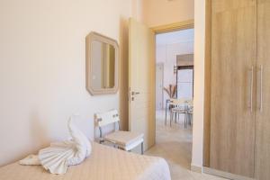 Postel nebo postele na pokoji v ubytování Mystique Apartment