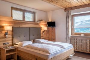 Posteľ alebo postele v izbe v ubytovaní Haus Sonnegg Sonnenuntergang