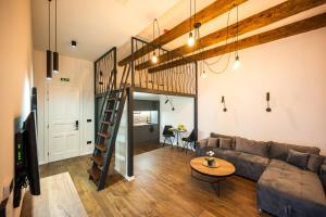 a living room with a couch and a table at Old Town Design Apartments in Sarajevo